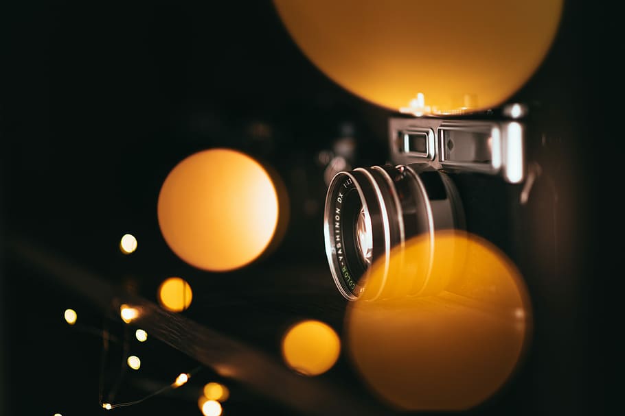 black and gray SLR camera with yellow bokeh light, black and silver SLR camera HD wallpaper