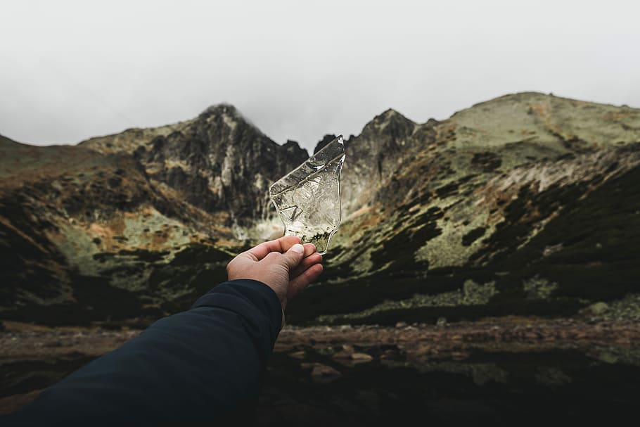 person holding glass, person holding ice, hand, mountain, rock HD wallpaper