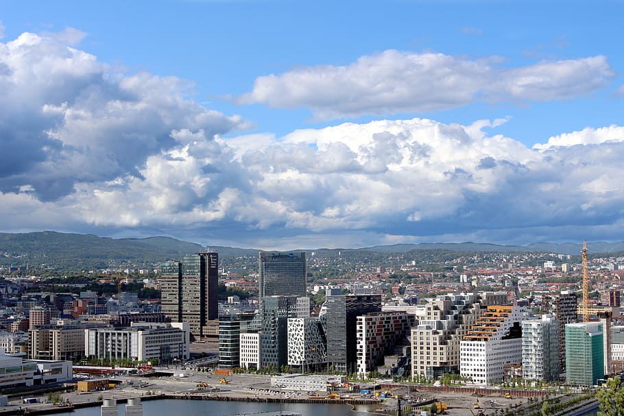 white clouds over city buildings during daytime, Oslo, Norway