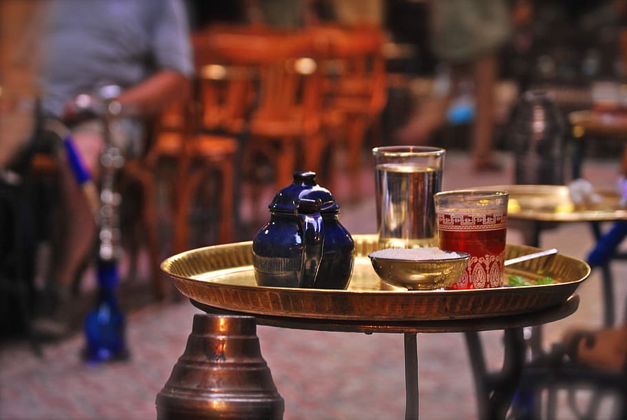 two glasses on tray, selective focus photography of drinking glass HD wallpaper