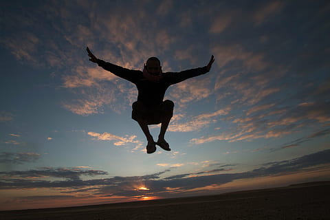 photography of person during sunset, dom, jumping, playing HD wallpaper
