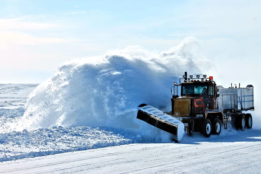 HD wallpaper: black freight truck with snow plow blade in snow covered ...