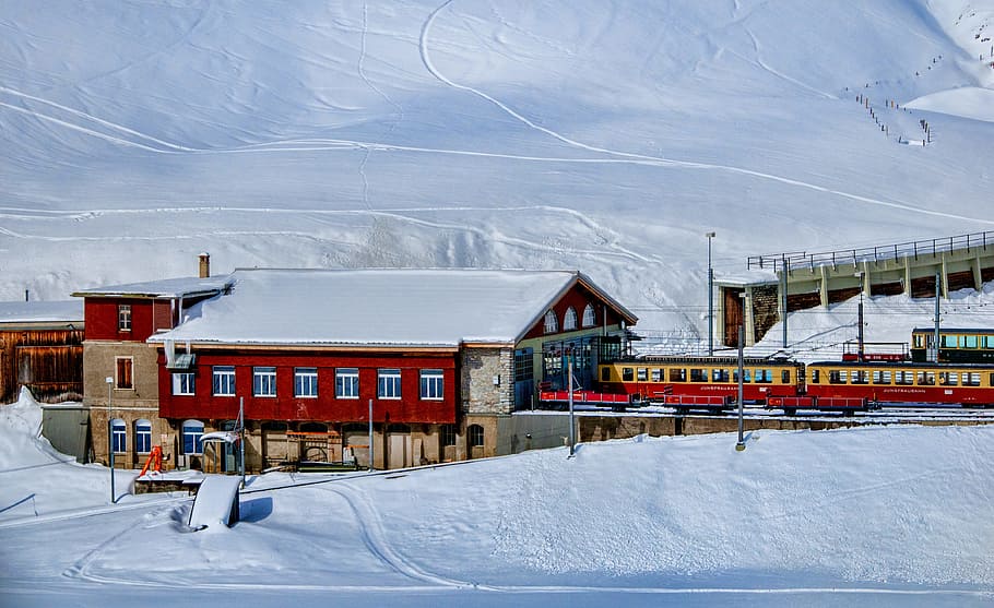 Yellow and Red Train Beside Snowy Mountain, architecture, building HD wallpaper