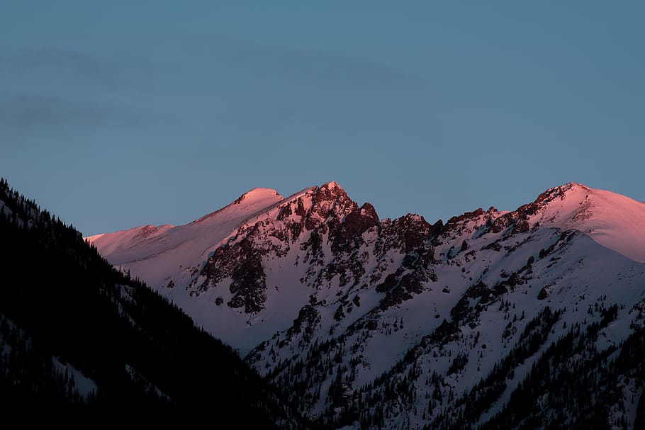 mountain covered in snow at golden hour, beige and brown mountain HD wallpaper