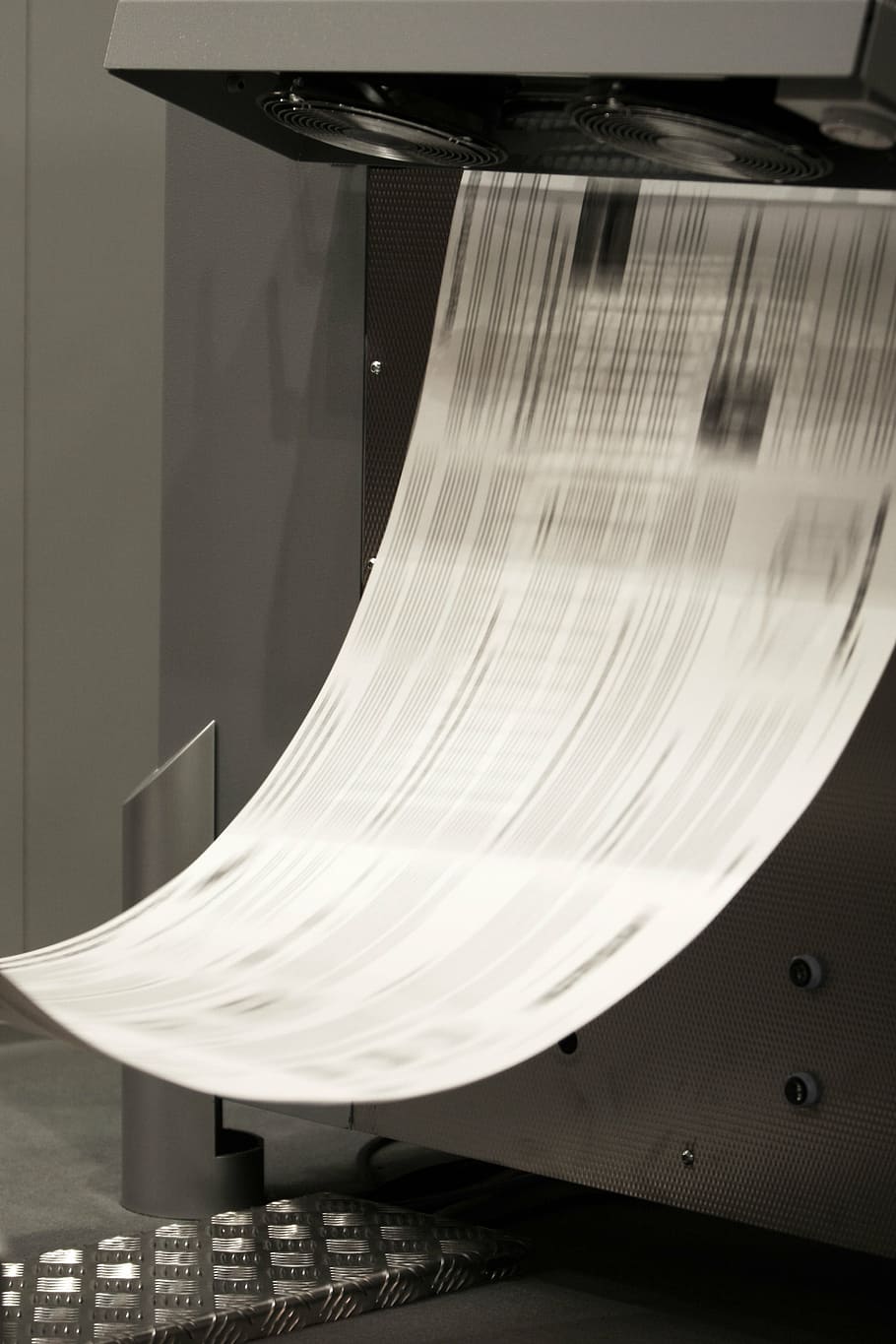 white paper under the machine, pressure, printing, printer, four-color printing