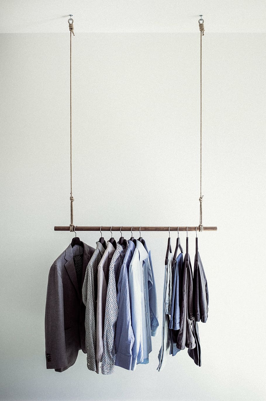 hanging dress shirt and pants, clothes rail, shirts, clothing