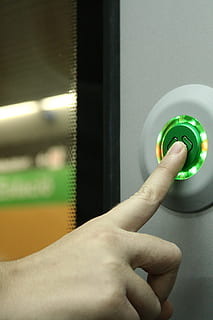 person touching \button, stop, station, underground, sign, symbol HD wallpaper