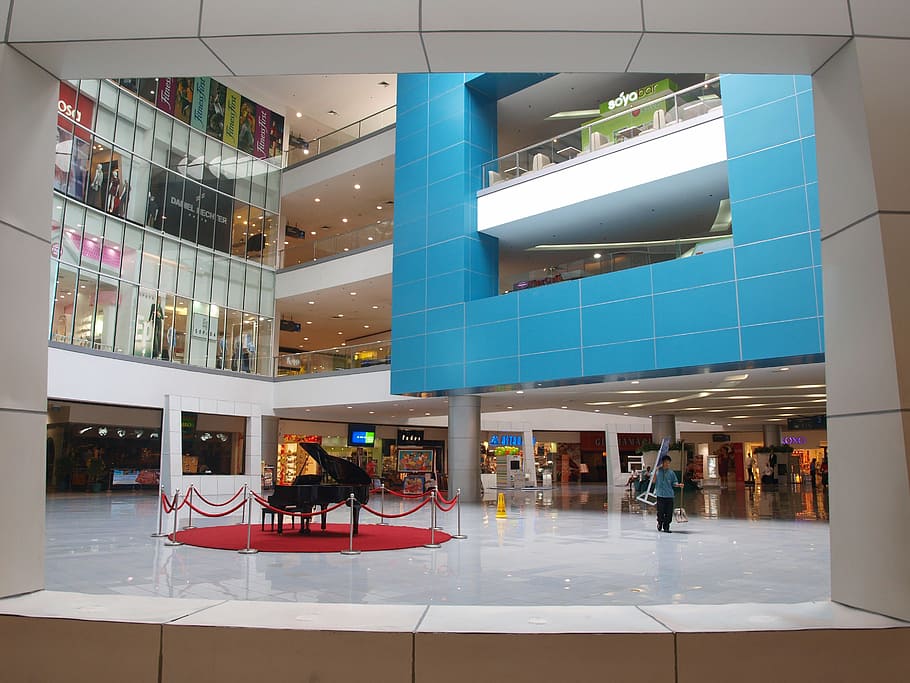 person walking in the building, mall, interior, store, retail HD wallpaper