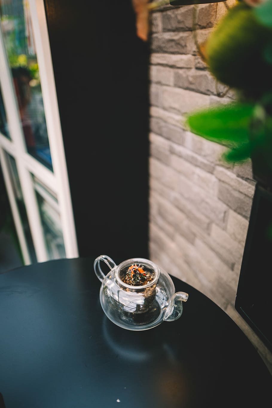 clear glass teapot on black wooden table, clear glass teapot with plant HD wallpaper