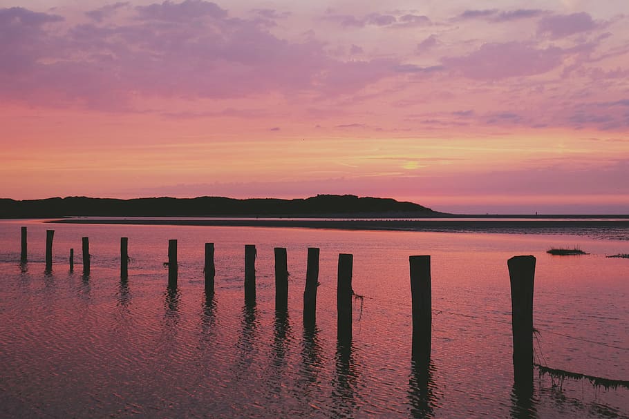 black wooden stamps, sunset, sea, beach, abendstimmung, afterglow HD wallpaper