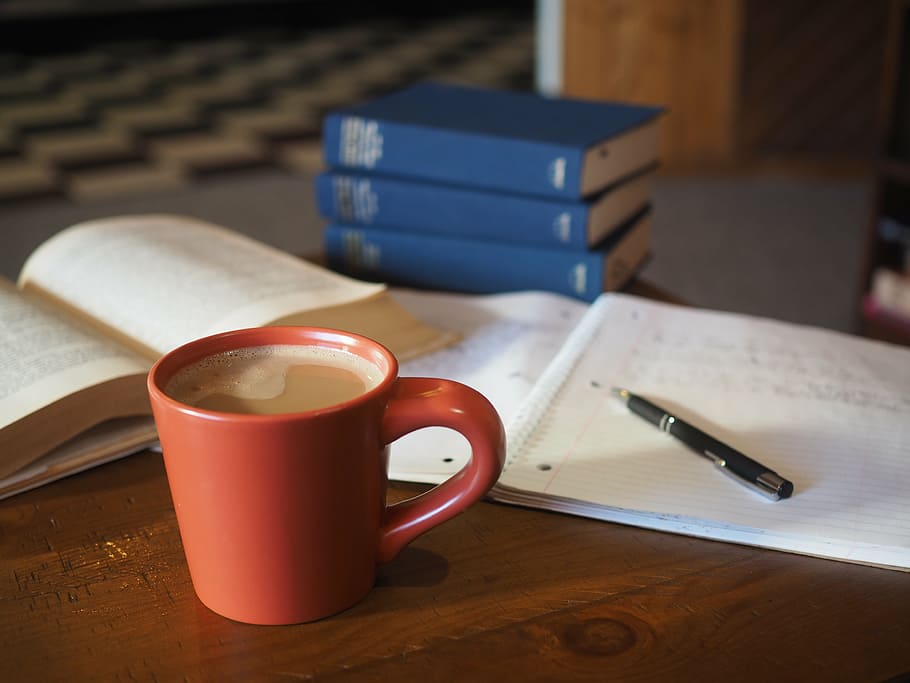 cup of coffee near click pen and notebook on table, school, homework, HD wallpaper