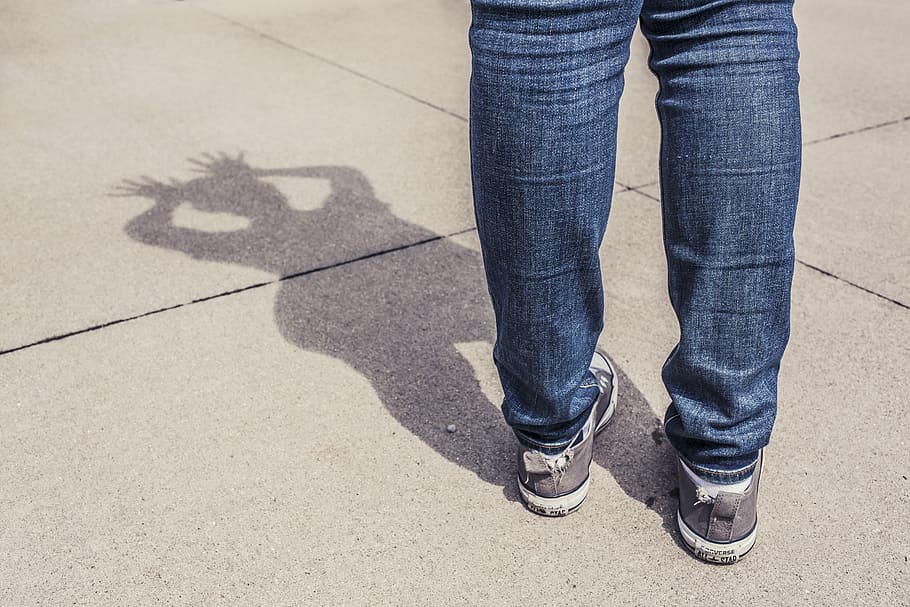 person's shadow wearing blue jeans and pair of gray sneakers, HD wallpaper