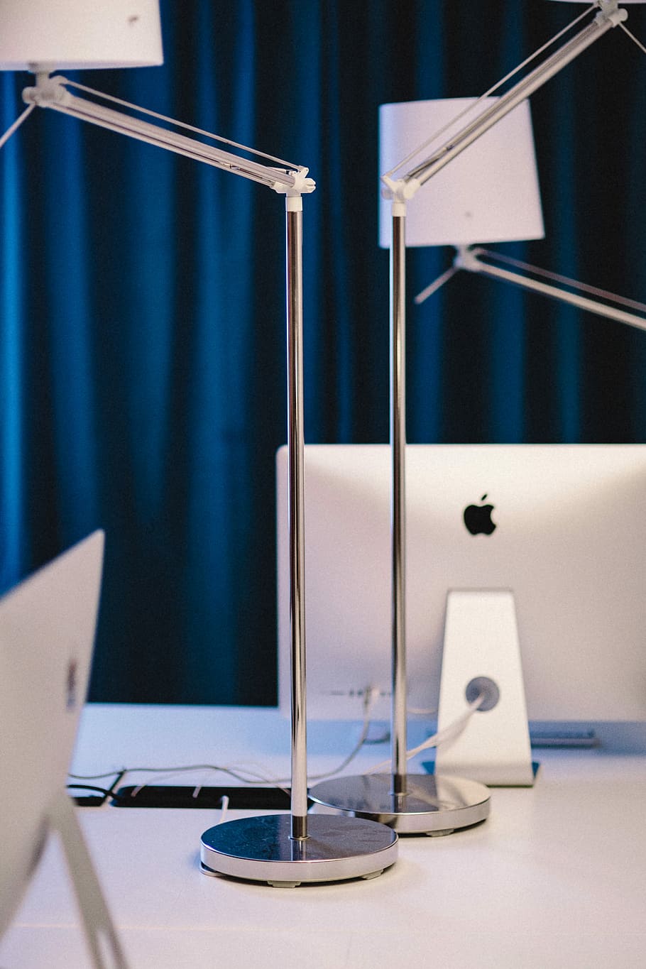 Closeup view of white lamps in the office, Apple iMac, workspace HD wallpaper
