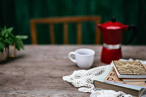 Stack of organizers and red italian coffee maker, vintage, notebook HD wallpaper