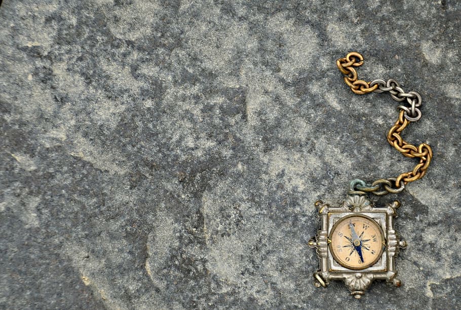 square silver framed watch with chain on pavement, compass HD wallpaper