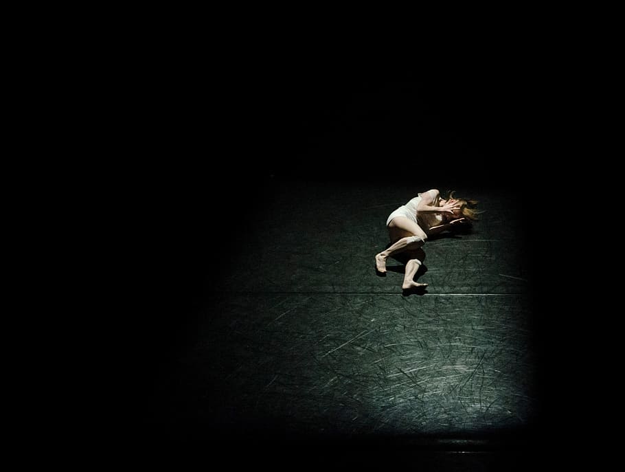 woman laying on black surface, animal, dark, full length, performance HD wallpaper