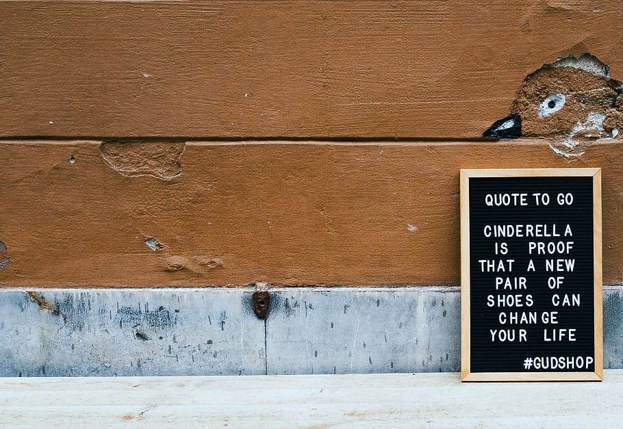 chalkboard leaning on brown concrete wall, quote to go cinderella is proof that a new pair of shoes can change your life, HD wallpaper