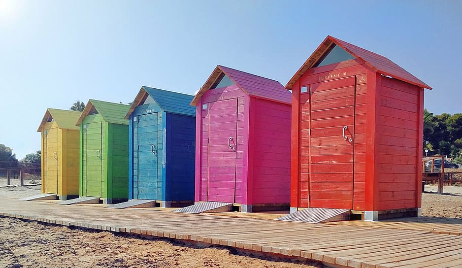 five multicolored outdoor toilet booths, beach, sea, costa, sun, HD wallpaper