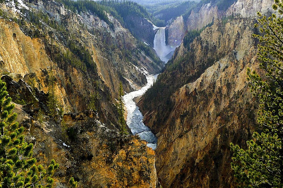 body of water in between cliff at daytime, yellowstone river