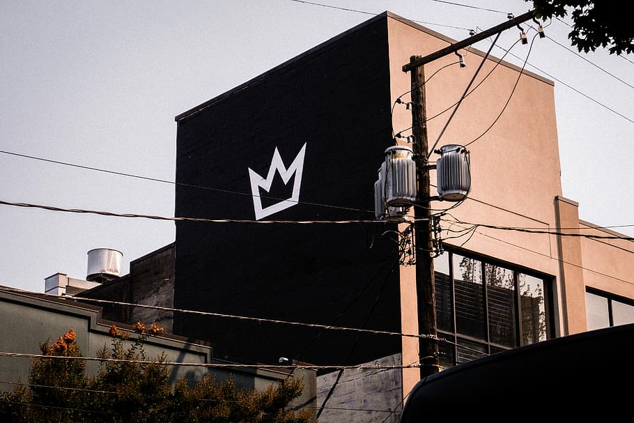 URBAN VIBE - SEATTLE, power line outside building with crown printed on wall HD wallpaper