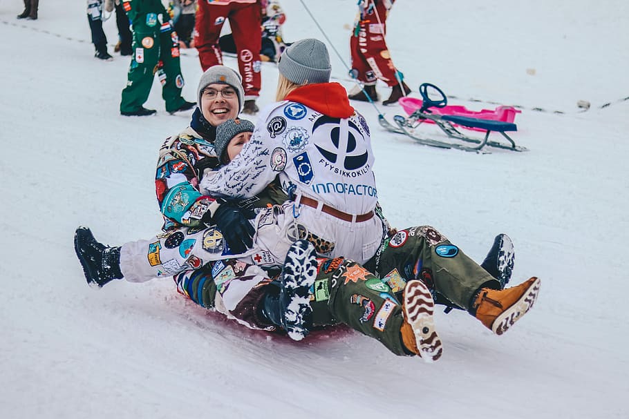 three persons riding on sled, three people riding snow sled, sledge HD wallpaper