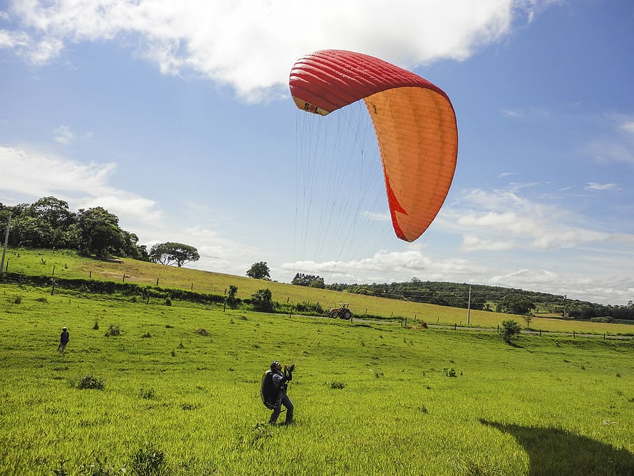 paragliding, flight, field, environment, landscape, sky, parachute HD wallpaper