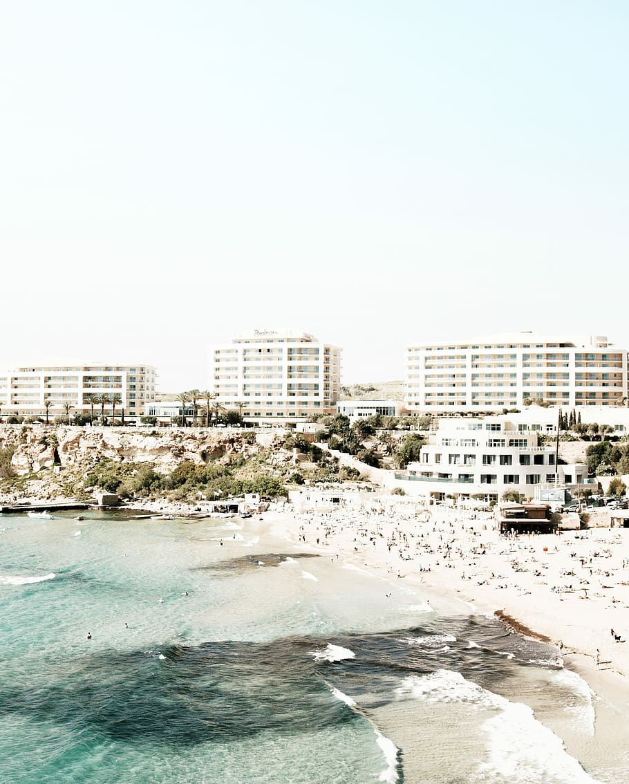 seashore with people, photo of beach and buildings, ocean, water HD wallpaper