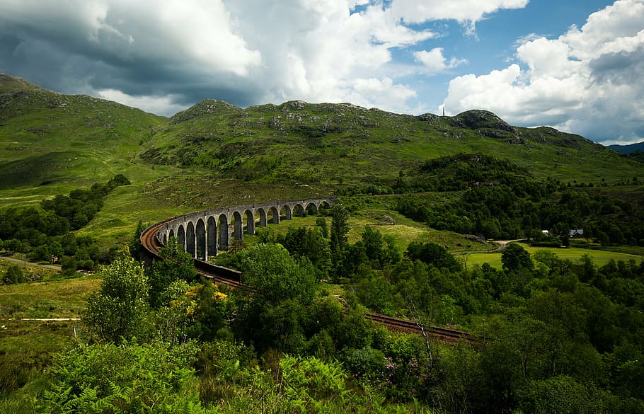 photo of valley and train track during daytime, clouds, cloudy HD wallpaper