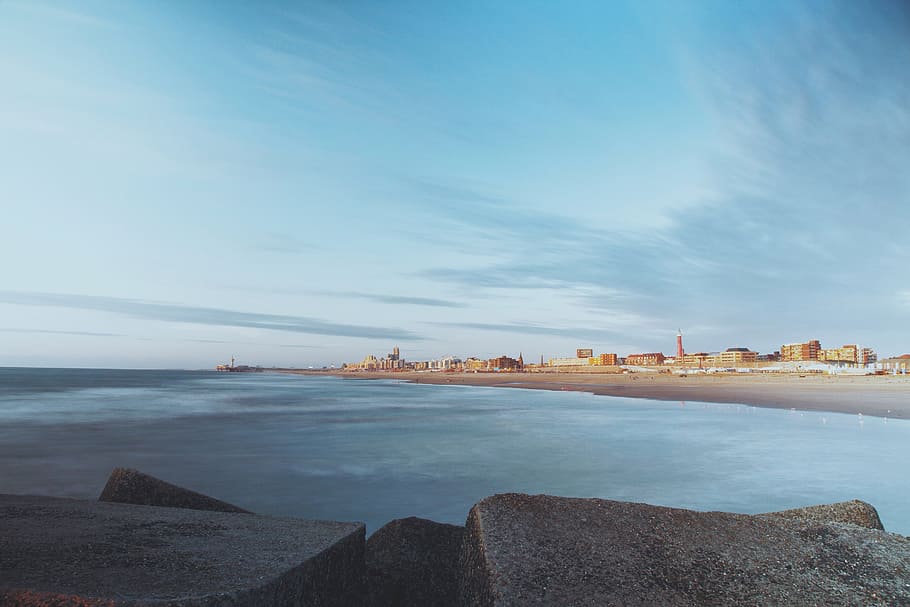 landscape, beach, sand, shore, ocean, sea, rocks, blue, sky HD wallpaper