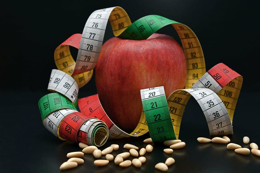 red apple fruit with measuring tape, pine nuts, remove, diet HD wallpaper