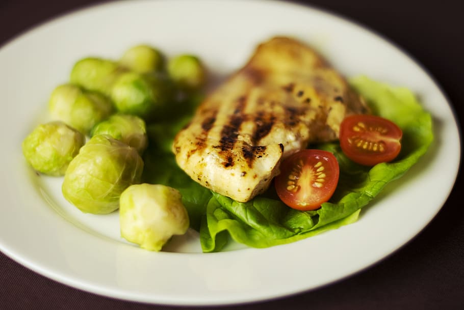 cooked food and vegetables on ceramic plate, chicken, brussels sprouts HD wallpaper