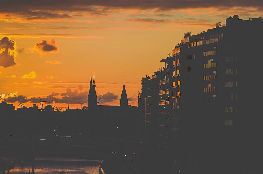 silhouette of concrete buildings during golden hour photo, architecture HD wallpaper