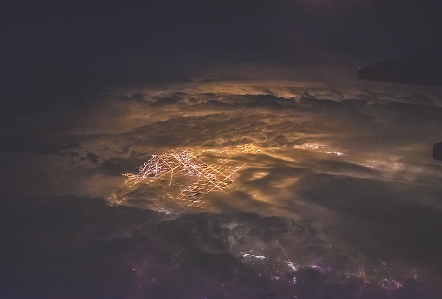bird's eyeview photo of rural town, aerial photo of city with lights turned on HD wallpaper