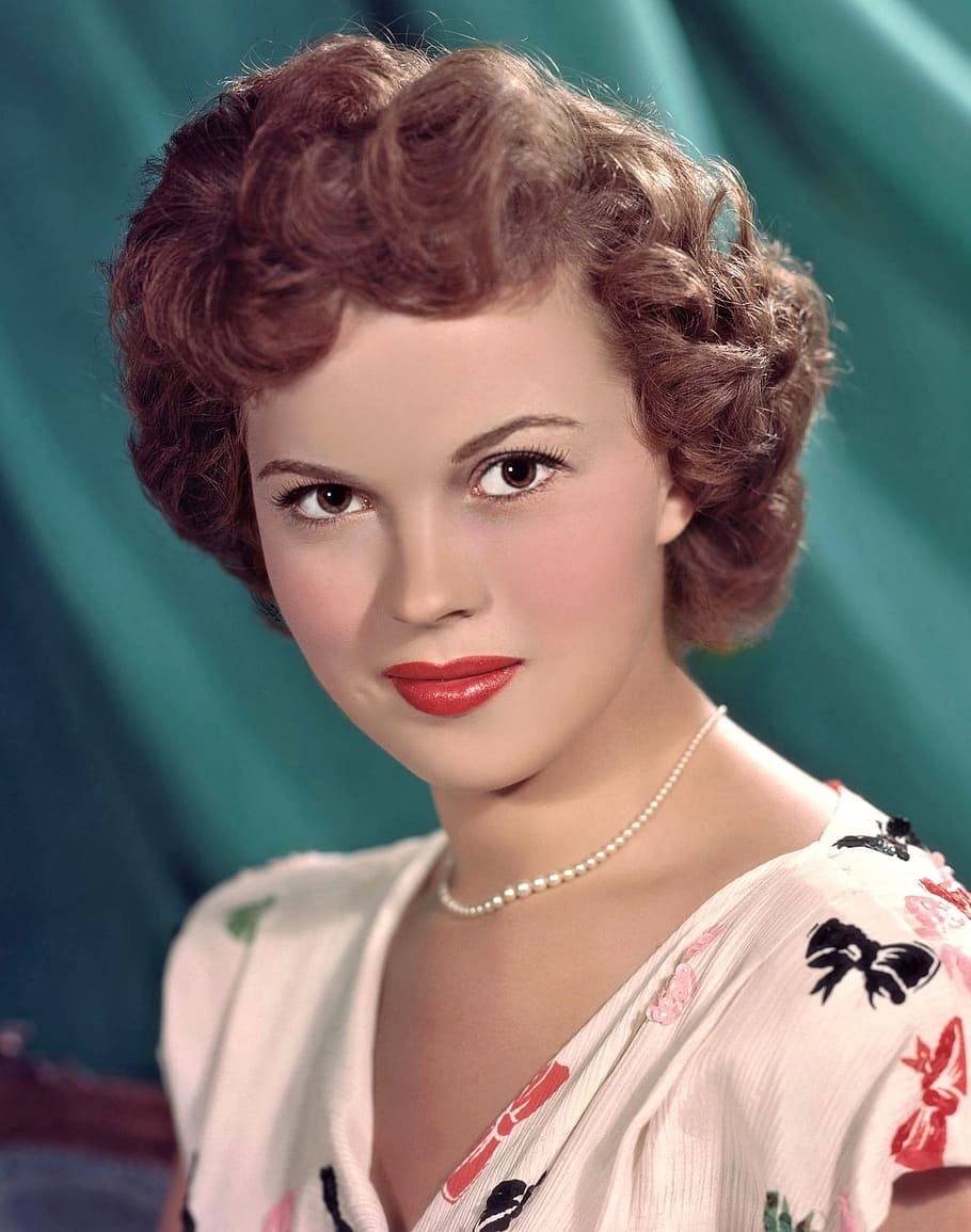woman wearing white and red floral top, shirley temple, actress
