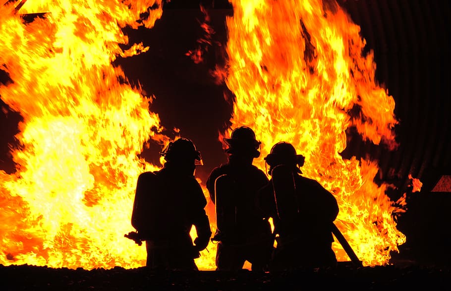 silhouette of men near fire, firefighters, demonstration, controlled fire HD wallpaper