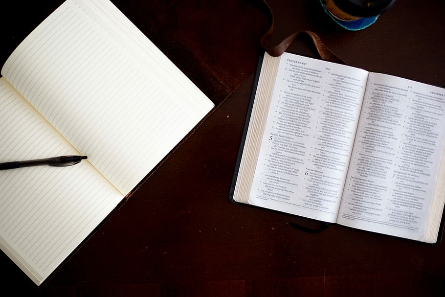 black click pen on white notebook, opened textbook beside opened notebook HD wallpaper