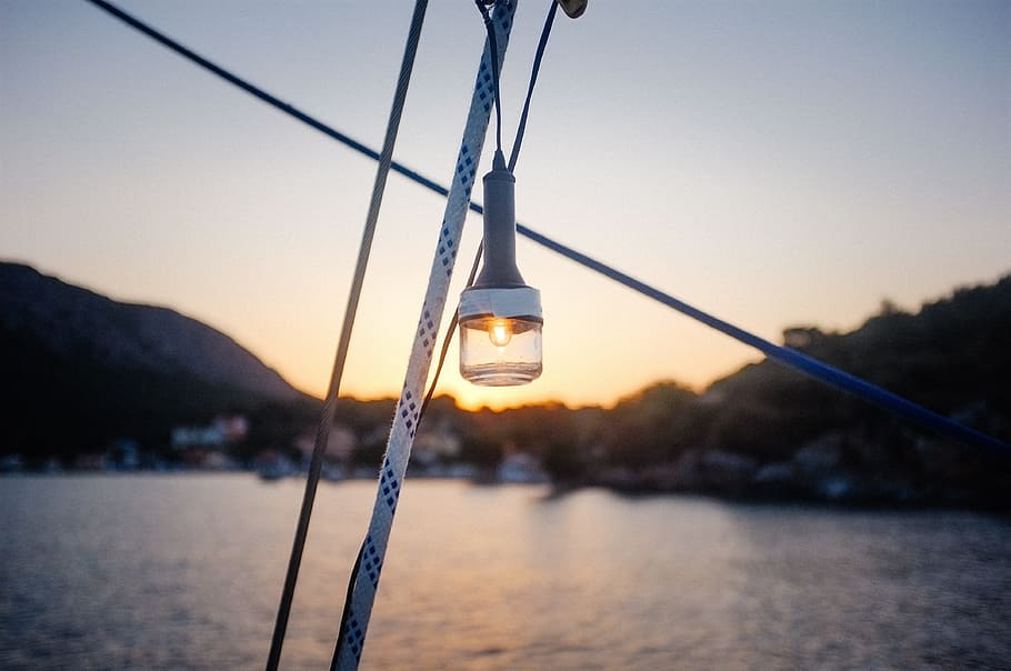 light, bulb, spark, sail, ship, water, ocean, sea, flashlight HD wallpaper