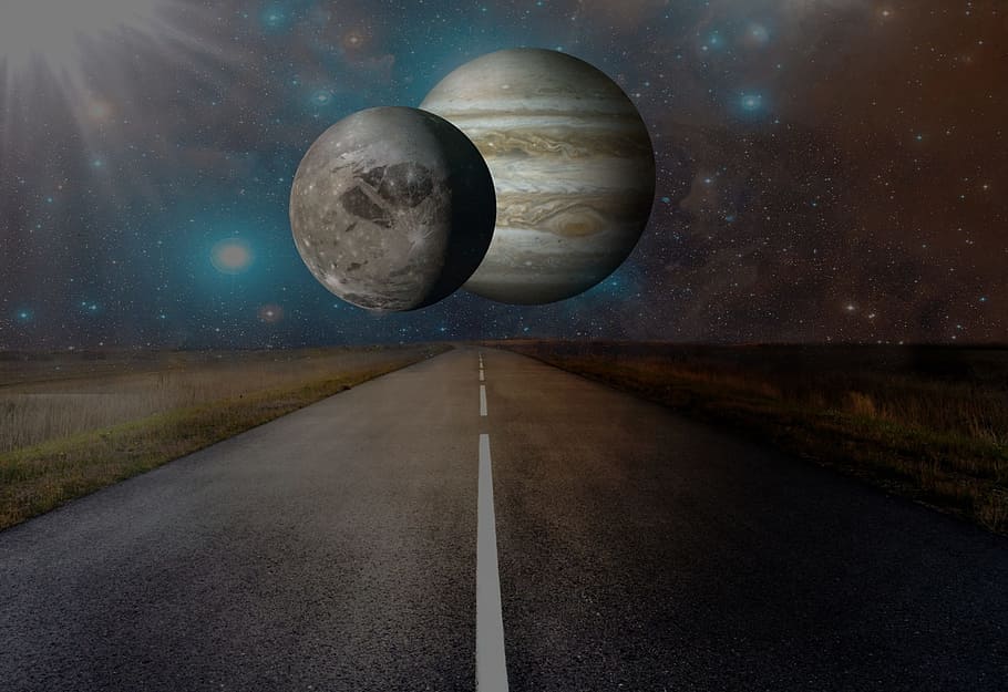 two planets in the middle of the street photo, road, asphalt