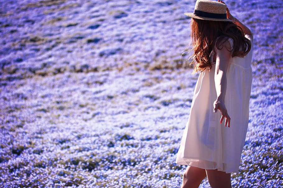photo of woman wearing white clothes walking on purple flower field HD wallpaper