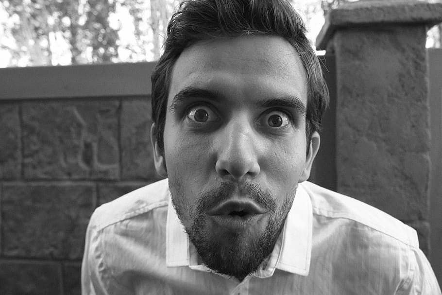 grayscale portrait photography of man in collared top, expression HD wallpaper
