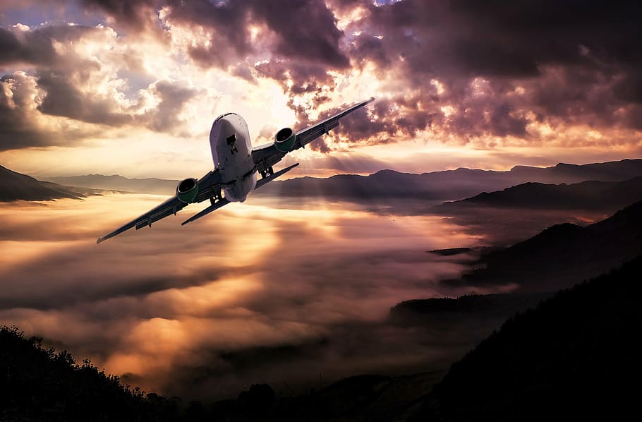 airliner in mid air above mountains, landscape, aircraft, clouds HD wallpaper