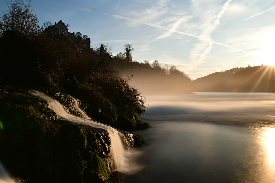 waterfalls near forest, rock, mountain, cliff, sea, sky, cloud - sky HD wallpaper