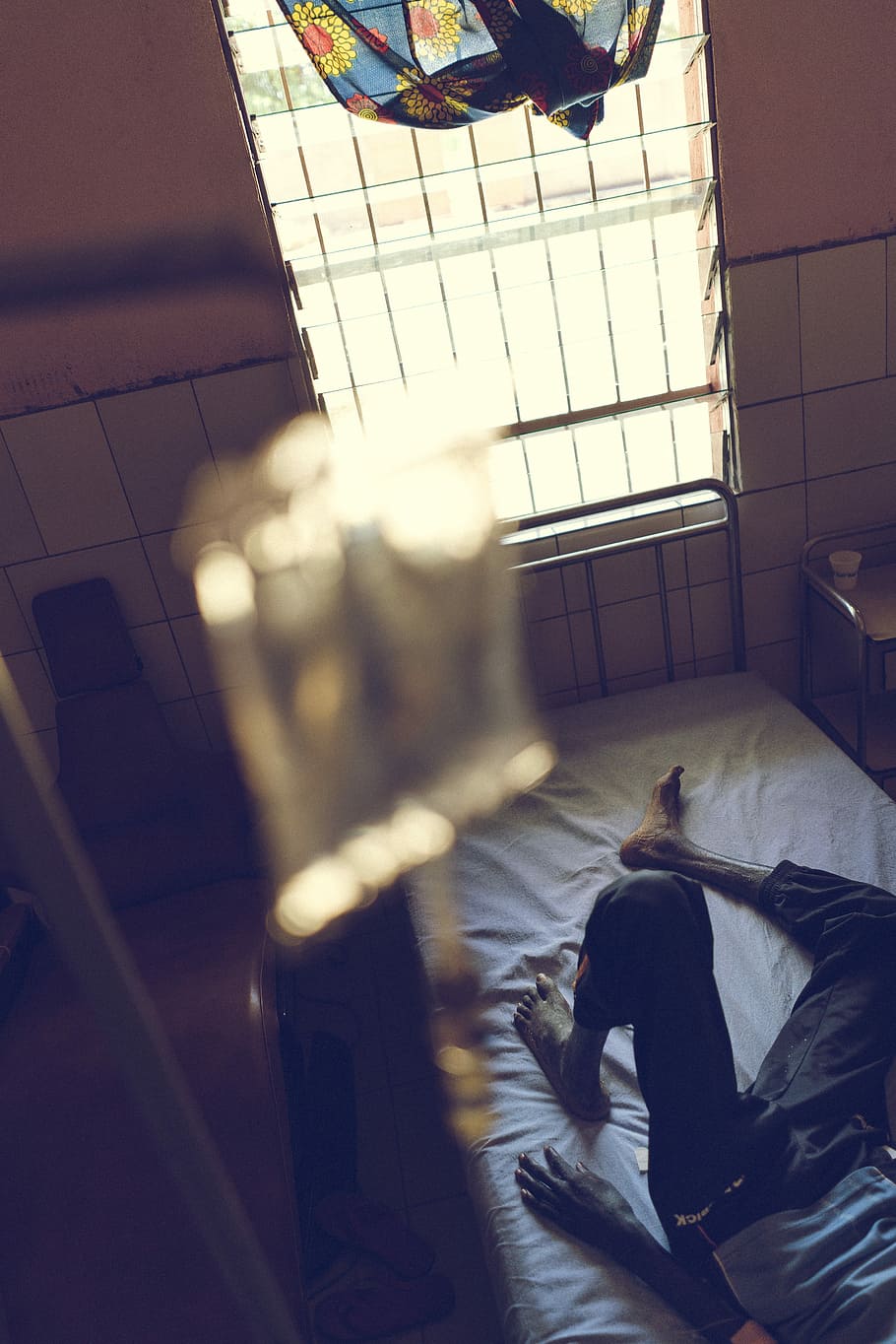 person wearing on mattress in room, person lying on bed near window, HD wallpaper