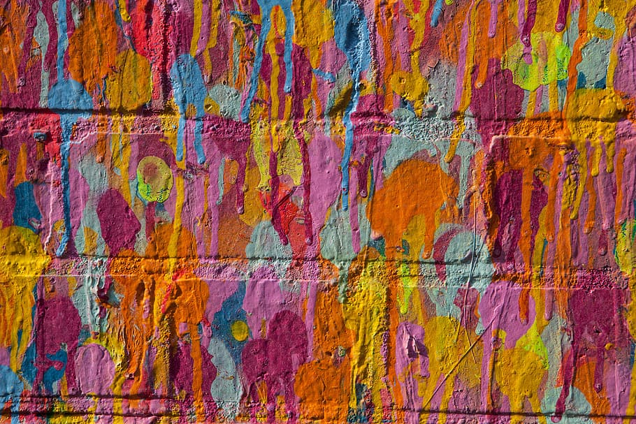 Close-up shot of vibrant multi-coloured on a brick wall in East London, England HD wallpaper
