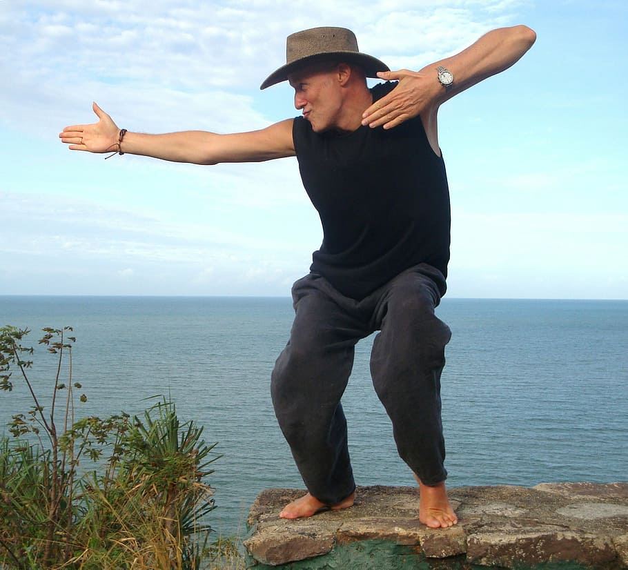 man wearing hat standing beside cliff, seminar, target, motivation, HD wallpaper