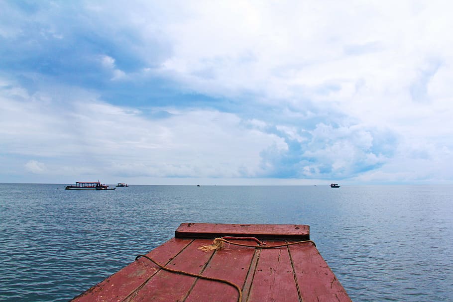 photography of calm sea under cloudy sky, water, boat, lake, unesco, HD wallpaper