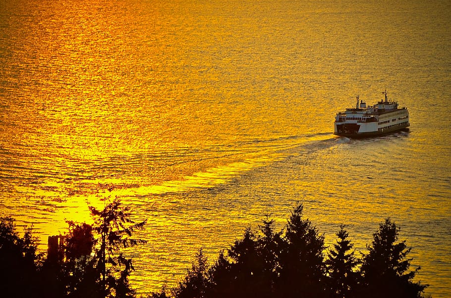 ferry boat on body of water during golden hour, nautical vessel HD wallpaper