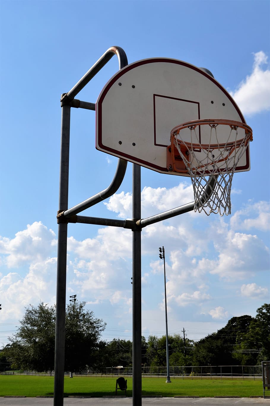 outdoor basketball court, houston, texas, backboard, rim, net