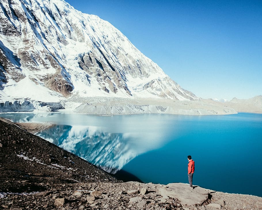 mountains, landscape, sky, clouds, man, ocean, guy, reflect HD wallpaper