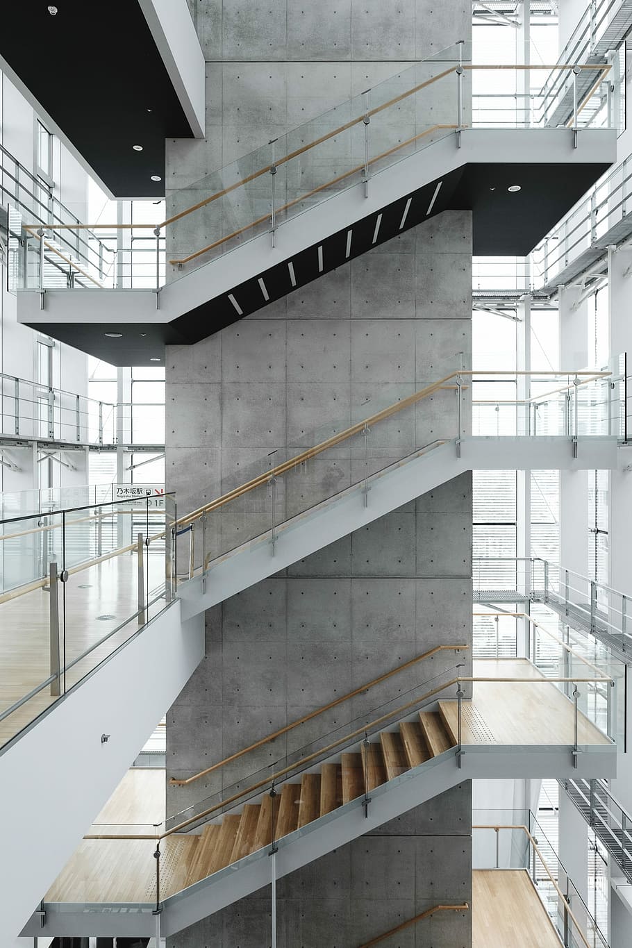 architectural photography of building with stairs, high-rise gray concrete building HD wallpaper